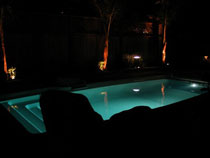 Image of a Classic Shaped In-ground Fiberglass Pools Installation at Night in Thorn Hill