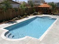 Image of an In-ground Fiberglass Pool with a Granite Color Finish in Oakville