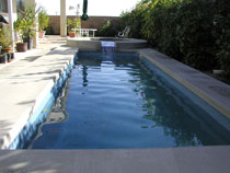 Image of a Lap Shaped In-ground Fiberglass Pool Installation in Ontario