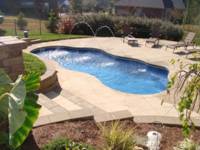 Image of an In-ground Pool Installation with a Pacific Blue Finish In a Backyard in Thorn Hill