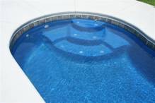 Image of Seats in an Inground Pool Designed with Ceramic Pool Tiles