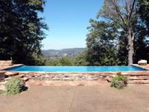 Image of an In-ground Fiberglass Pool Complemented with a Vanishing Edge In Thorn Hill